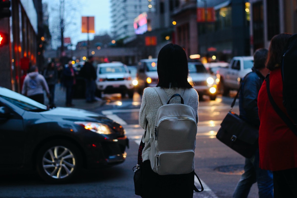 Woman walking alone in a city